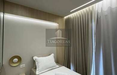 Imagem 4: Apartamento Moderno na Barra: 2 quartos, suíte, vista mar e área de lazer completa.PORTEIR