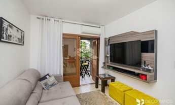 Imagem 2: Apartamento para venda tem 75 metros quadrados com 2 quartos em Cristo Redentor - Porto Al