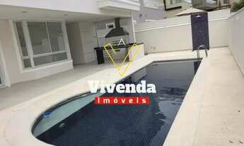 Imagem 3: Viva com conforto e sofisticação em Alphaville: Casa de alto padrão com 4 suítes e 478m²!