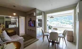 Imagem 6: Apartamento semimobiliado de 2 quartos (1 suíte), sacada com vista para o mar e 2 garagens