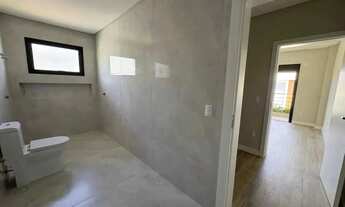 Imagem 7: Casa de alto padrão com 4 dormitórios sendo 3 suítes e 4 vagas de garagem em Camboriú/SC