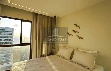 Imagem 6: Apartamento Moderno na Barra: 2 quartos, suíte, vista mar e área de lazer completa.PORTEIR