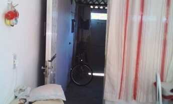 Imagem 5: Casa com quintal e garagem