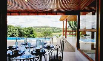 Imagem: Aconchegante casa pé na água na represa