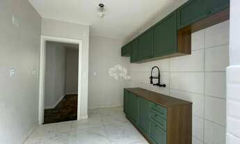 Imagem 4: Apartamento térreo, reformado, 54,75m2 de área privativa, 2 dormitórios, 1 vaga rotativa