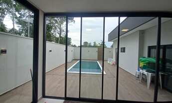 Imagem 2: Casa de condomínio para venda possui 202 metros quadrados com 3 quartos em Ponta Negra - M