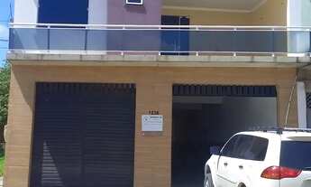 Imagem 6: Dois apartamentos e um galpão com dique de lavar carros