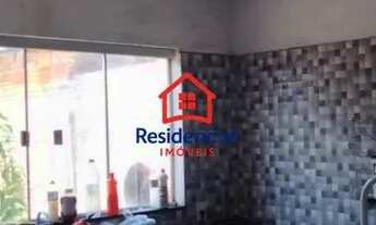 Imagem 7: Casa frente praça