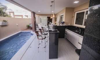 Imagem 2: Casa de condomínio para venda possui 350 metros quadrados com 4 quartos