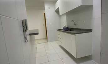 Imagem 3: Apartamento á venda tem 65 m2 com 2 quartos suite armários na cozinha, andar baixo