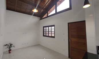 Imagem 6: Casa sobreposta lado praia com piscina