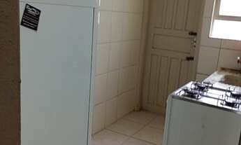 Imagem 3: Um dormitório lado praia uma vaga de gargem