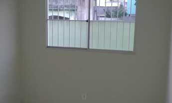 Imagem 6: Casa 2 quartos, quintal gramado e garagem coberta