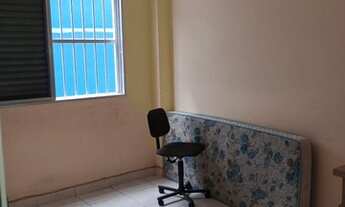 Imagem 2: Um dormitório lado praia uma vaga de gargem