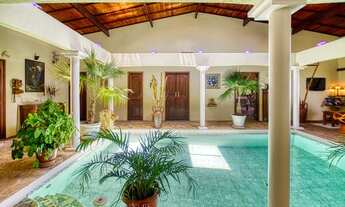 Imagem: Casa com piscina e viveiro de camarão com