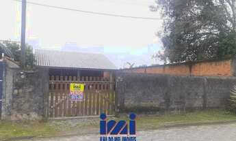 Imagem: Casa na praia com espaço de terreno