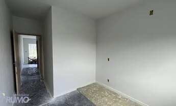 Imagem 7: Casa nova pronta para morar, com massa corrida na parede e passagem na lateral