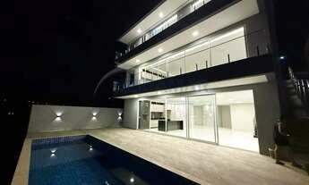 Imagem 4: Casa Nova e Sofisticada com 5 Suítes, Piscina e Elevador à Venda no Condomínio Máxximo Gar