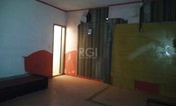 Imagem 7: Casa comercial em av. de grande fluxo, ampla loja no térreo, residencia com 03 dorm, na pa