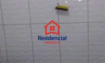 Imagem 4: Casa frente praça