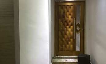 Imagem: Casa térrea com edícula aos fundos no