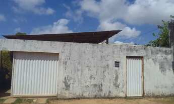 Imagem 3: Vendo está casa contendo um quarto toda murada