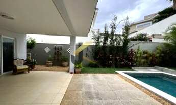 Imagem 2: Casa em condomínio à venda na região do Alphaville, com 4 suítes e lazer comum