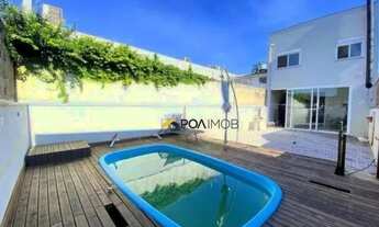 Imagem 2: Casa com 2 dormitórios para alugar, 180 m² por R$ 4.966,00/mês - Navegantes - Porto Alegre