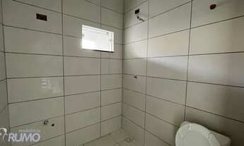 Imagem 4: Casa nova pronta para morar, com massa corrida na parede e passagem na lateral