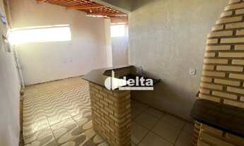 Imagem 5: Casa com 3 dormitórios para alugar, 100 m² por R$ 1.700,00/mês - Mansour - Uberlândia/MG