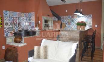 Imagem 3: Casa em Condomínio para comprar no bairro Guarujá - Porto Alegre com 3 quartos