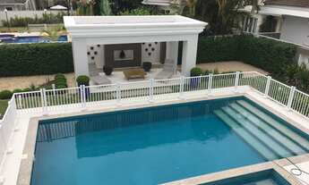 Imagem 2: Casa para venda possui 1000 metros quadrados com 5 quartos.