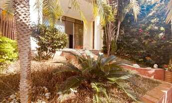 Imagem 2: Casa comercial com 3 salas de atendimento, recepção, banheiro e jardim, próximo a academia