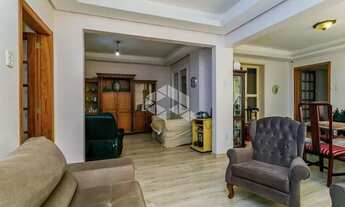 Imagem 4: Apartamento de 113m2, living em 3 ambientes cercado por jardim de inverno