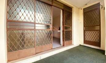 Imagem 3: Casa comercial com 3 salas de atendimento, recepção, banheiro e jardim, próximo a academia