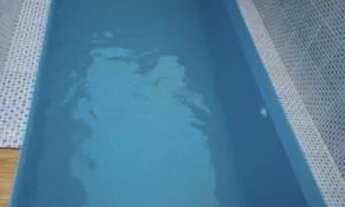 Imagem 3: Casa sobreposta com piscina e churrasqueira. Itanhaém/SP