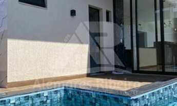 Imagem 3: Casa térrea Alto Padrão condomínio Fechado 3 Suítes