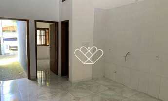 Imagem 3: Encontre o Seu Novo Lar: Casa Aconchegante com Quintal em Bairro Tranquilo