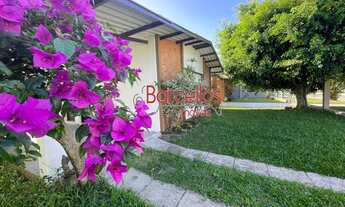 Imagem 2: Casa em Imbé ao lado de avenida principal com três dormitórios