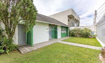 Imagem 2: Casa de esquina à venda com 3 dormitórios no bairro Bacacheri - Curitiba PR