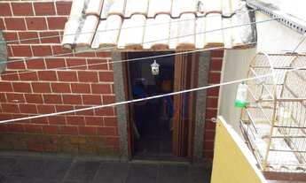 Imagem 4: Sobrado com 3 dormitórios à venda, 150 m² por R$ 450.000,00 - Cidade São Jorge - Santo And