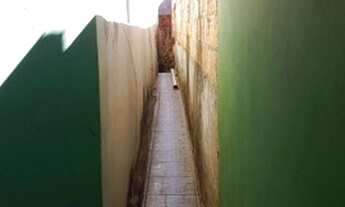 Imagem 5: Casa com outra no fundo