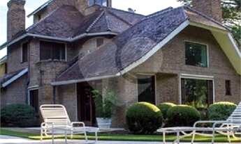 Imagem 3: Mansão de 630,90 m², estilo Europeu e com 8 vagas na zona Sul de Porto Alegre