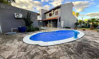 Imagem 7: Casa à venda com dois terrenos, piscina aquecida, edícula completa e porteira fechada, no