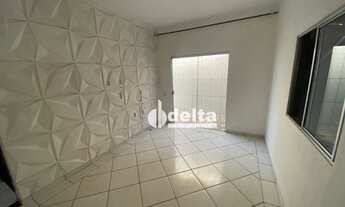 Imagem 6: Casa com 3 dormitórios para alugar, 100 m² por R$ 1.700,00/mês - Mansour - Uberlândia/MG