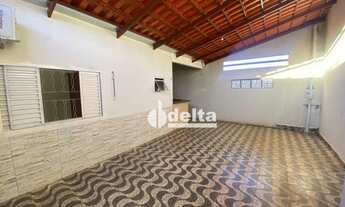Imagem 2: Casa com 3 dormitórios para alugar, 100 m² por R$ 1.700,00/mês - Mansour - Uberlândia/MG