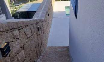 Imagem 3: Casa de condomínio para venda tem 315 metros quadrados com 4 quartos