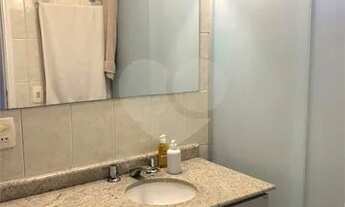 Imagem 5: Apartamento com 129m2, com sala para dois ambientes, todos com piso.São 3 dormitórios send