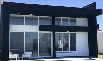 Imagem 2: Casa de condomínio para venda com 150 metros quadrados com 4 quartos em Centro - Xangri-Lá