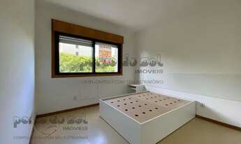 Imagem 7: Apartamento com sacada, churrasqueira e garagem